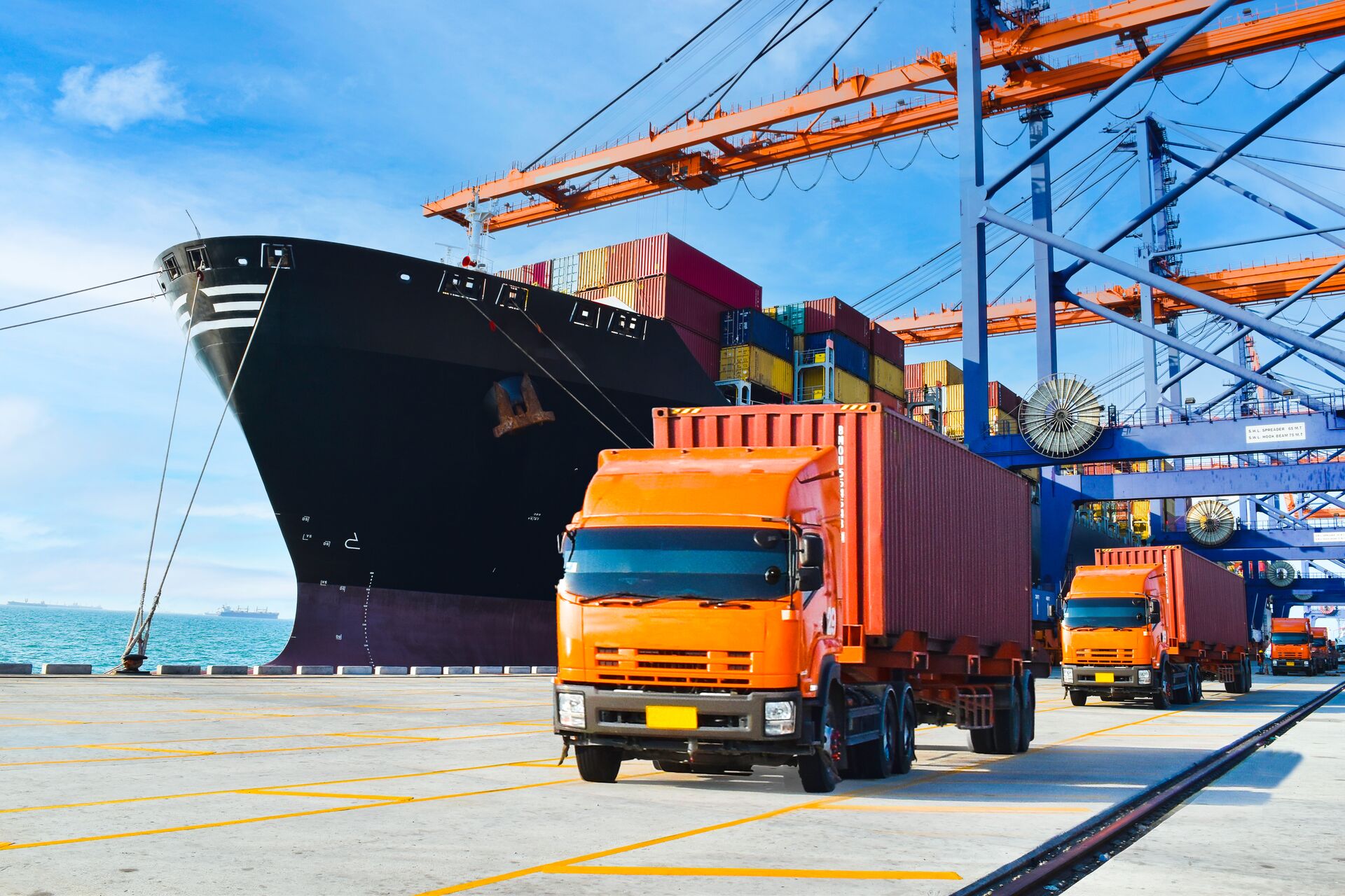 Container trucks operating at a port terminal
